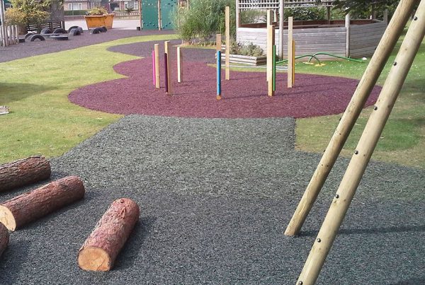 Coloured Rubber Mulch on Grass