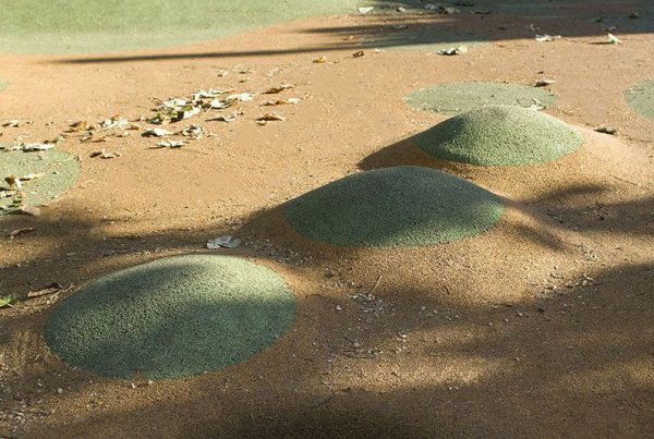 mounds within wet pour play flooring